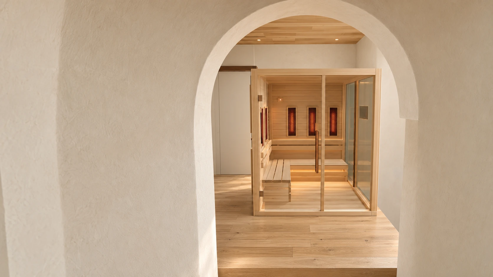 Le sauna infrarouge, vu à travers une arche, rendu du futur gîte
